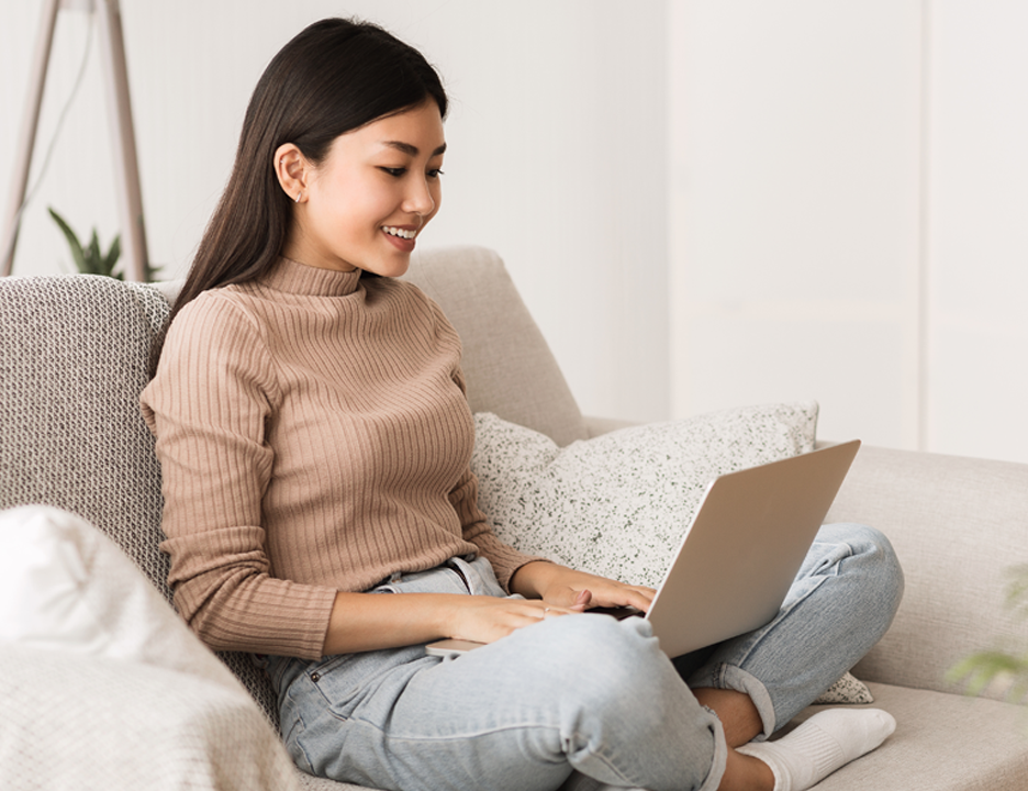 ExamSmart Image (Asian Woman on Laptop)